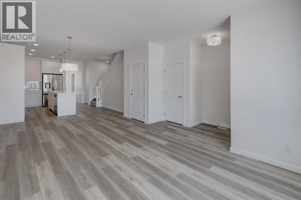 47 Lewisburg Manor Ne, Calgary, Alberta  T3P 2N7 - Photo 5 - A2301813