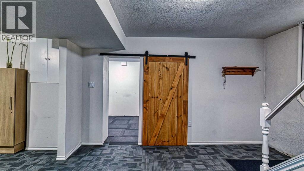 5924 Bow Crescent NW, Calgary, Alberta  T3B 2B7 - Photo 32 - A2306483