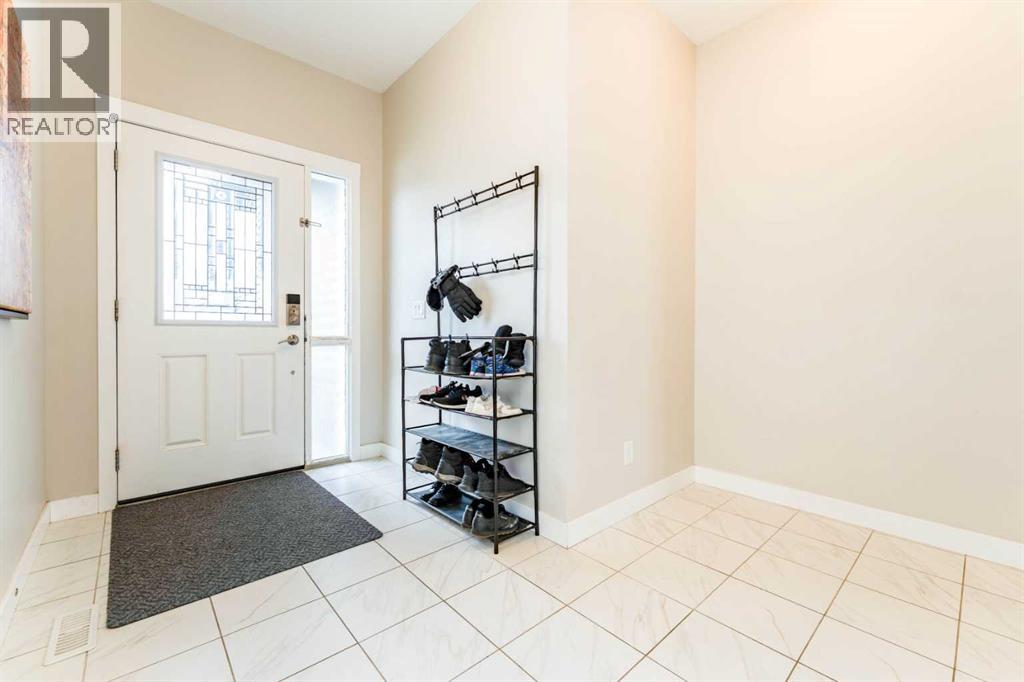 42 Buckskin Way, Cochrane, Alberta  T4C 2P1 - Photo 3 - A2310258