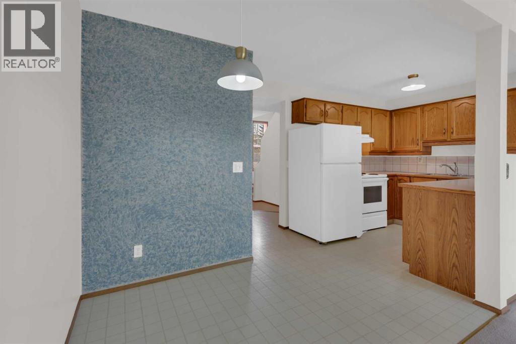 216 Shawinigan Drive SW, Calgary, Alberta  T2Y 3B4 - Photo 6 - A2309802