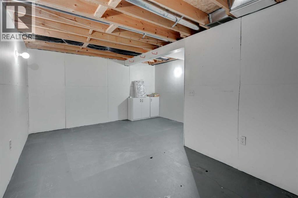 216 Shawinigan Drive SW, Calgary, Alberta  T2Y 3B4 - Photo 25 - A2309802