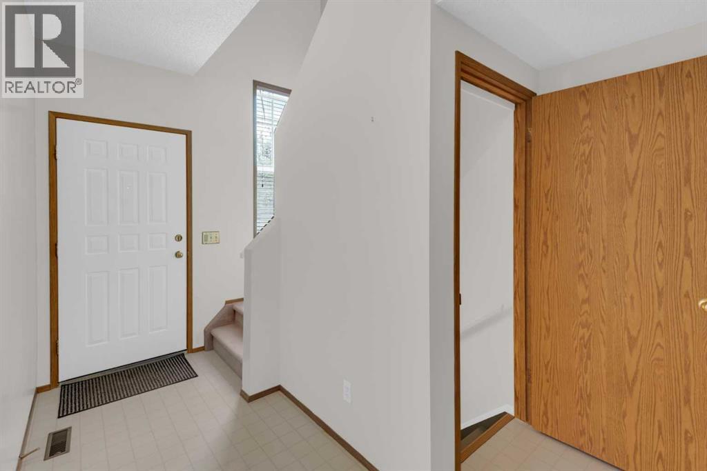 216 Shawinigan Drive SW, Calgary, Alberta  T2Y 3B4 - Photo 2 - A2309802