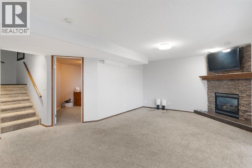 16 Bow Ridge Drive, Cochrane, Alberta  T4C 1V6 - Photo 32 - A2310835