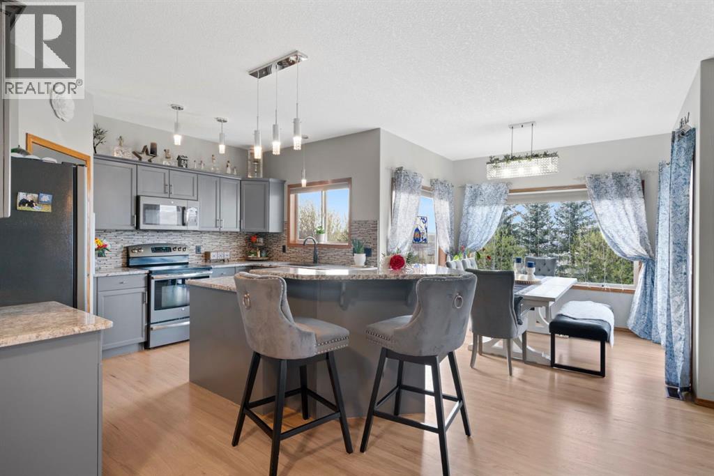16 Bow Ridge Drive, Cochrane, Alberta  T4C 1V6 - Photo 2 - A2310835