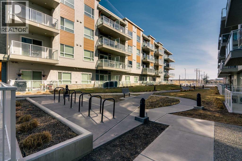 410, 200 Harvest Hills Place Ne, Calgary, Alberta  T3K 2N3 - Photo 1 - A2296524