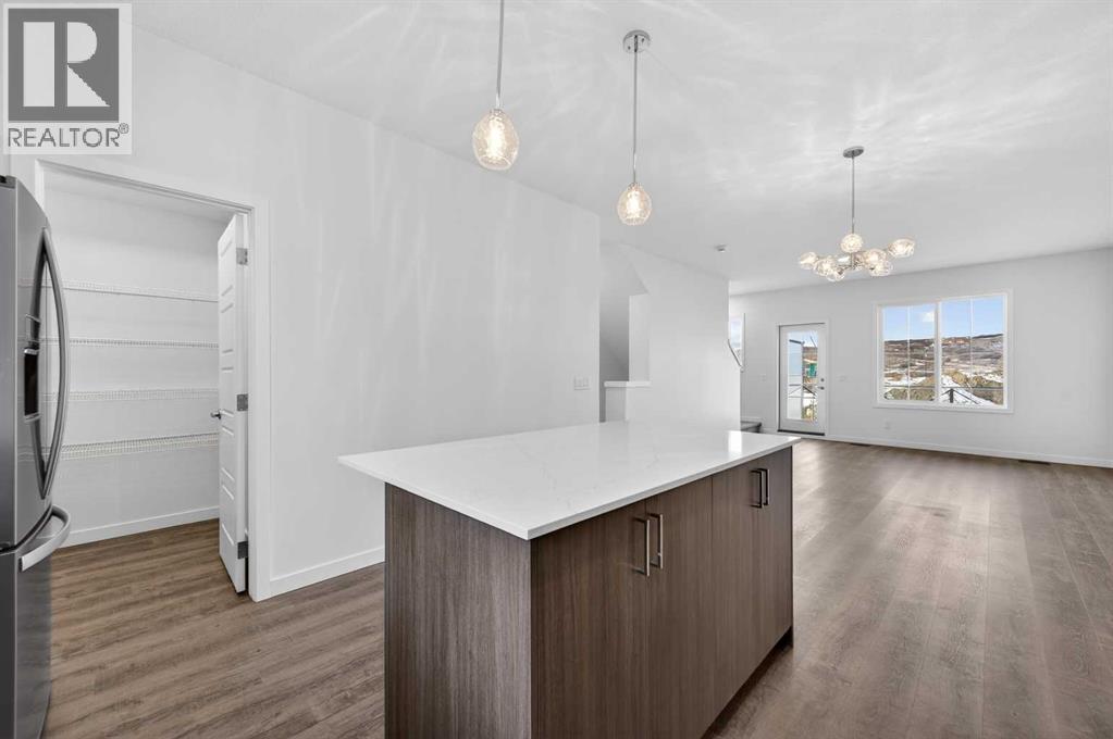 56 Creekside Drive Sw, Calgary, Alberta  T2X 6E2 - Photo 14 - A2311243