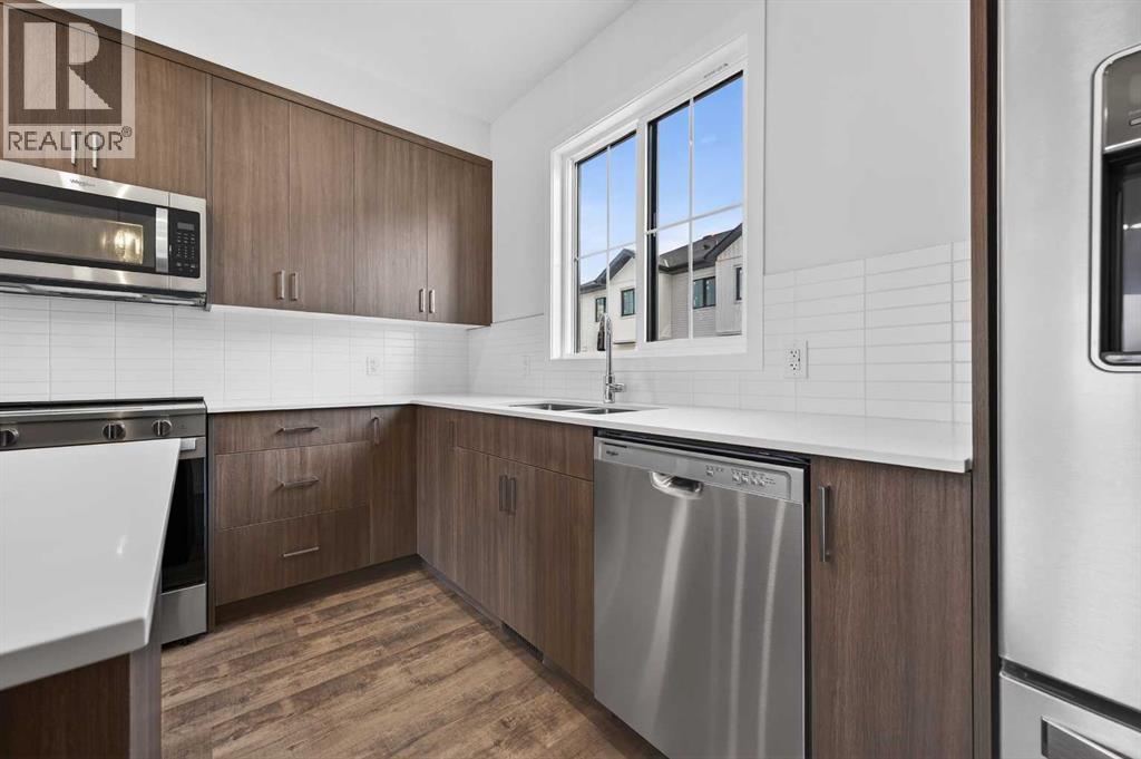 56 Creekside Drive Sw, Calgary, Alberta  T2X 6E2 - Photo 13 - A2311243