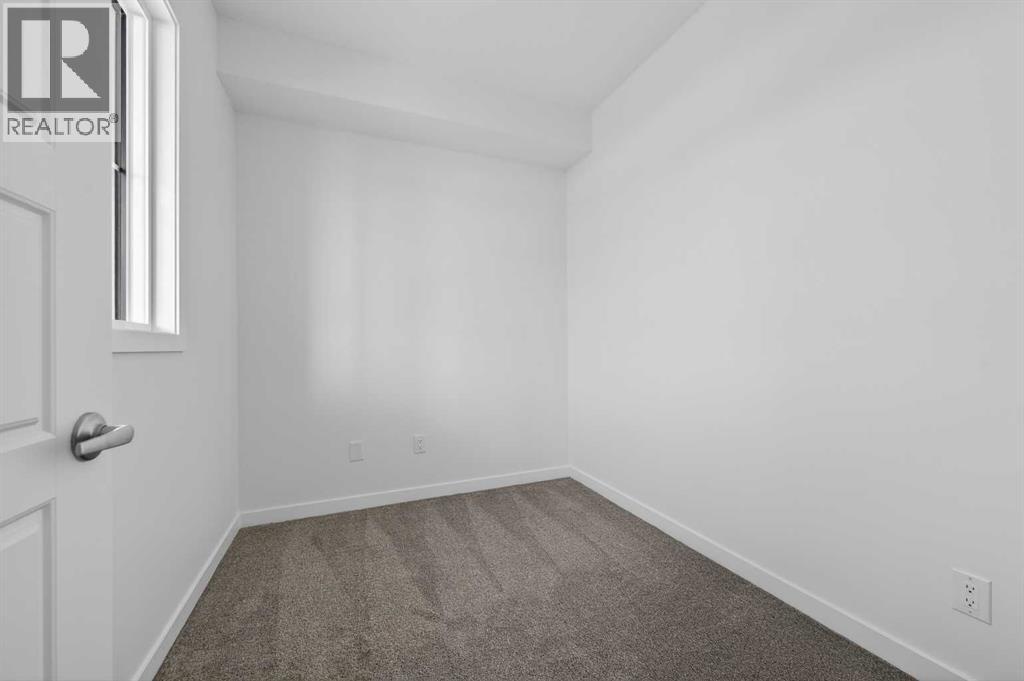 56 Creekside Drive Sw, Calgary, Alberta  T2X 6E2 - Photo 7 - A2311243