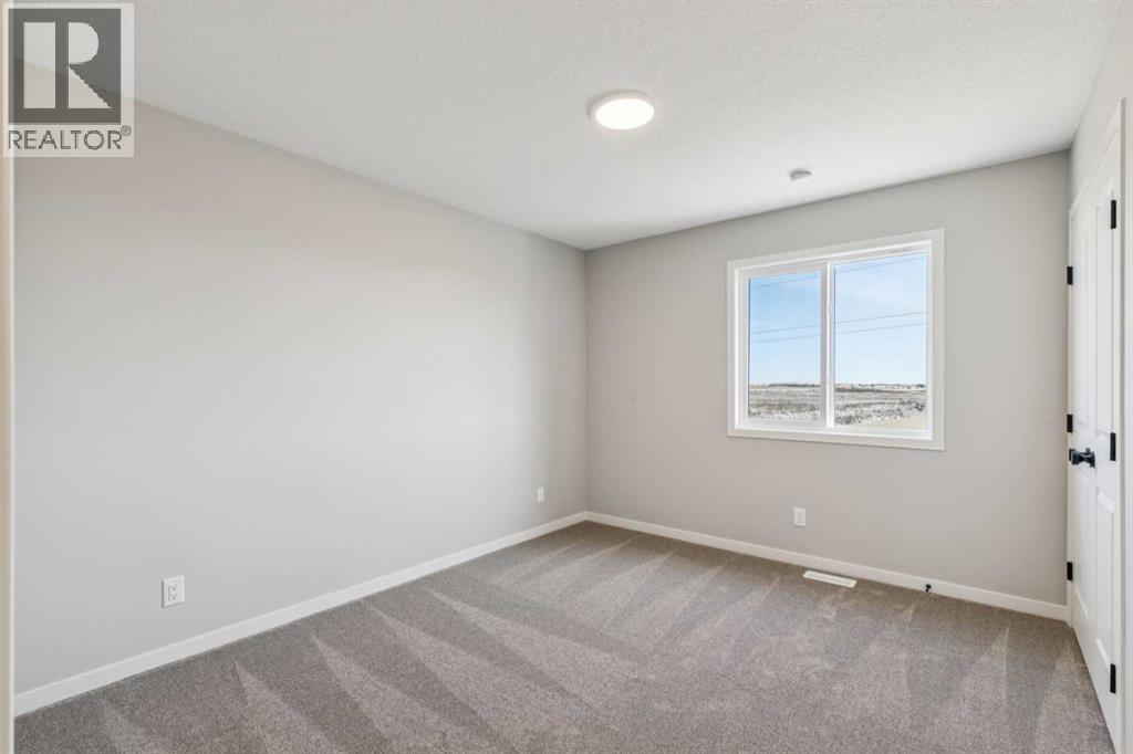 338 Hotchkiss Manor SE, Calgary, Alberta  T3S 0J9 - Photo 23 - A2301222