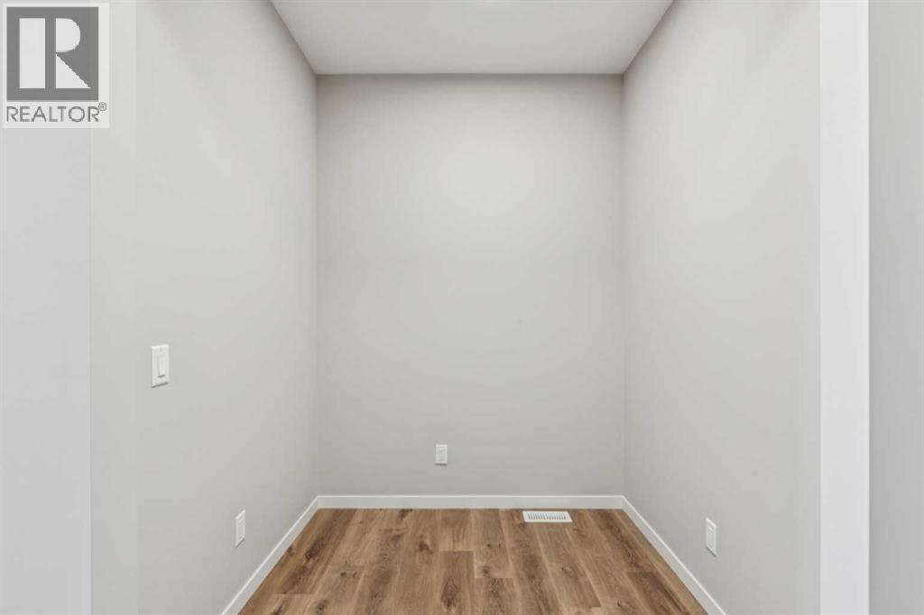 338 Hotchkiss Manor SE, Calgary, Alberta  T3S 0J9 - Photo 4 - A2301222