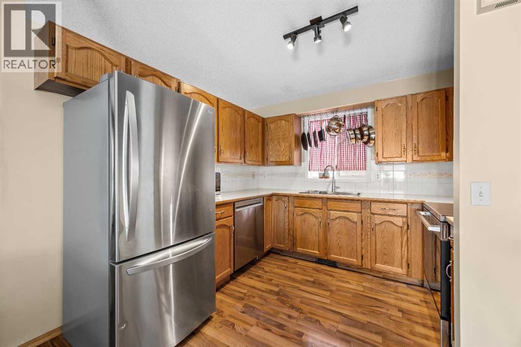 316 Coventry Close Ne, Calgary, Alberta  T3K 4C5 - Photo 11 - A2306059