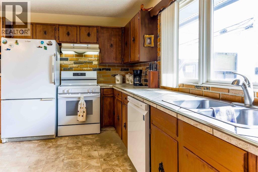 1444 Acadia Drive SE, Calgary, Alberta  T2J 3B1 - Photo 7 - A2310161