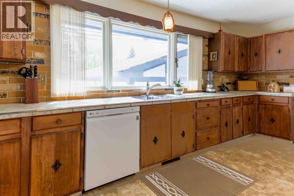 1444 Acadia Drive SE, Calgary, Alberta  T2J 3B1 - Photo 6 - A2310161