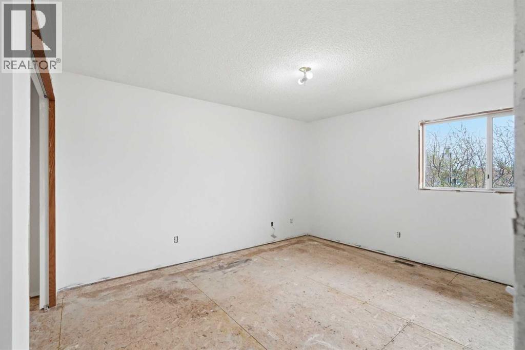 180 Woodside Road Nw, Airdrie, Alberta  T4B 2E2 - Photo 10 - A2311289