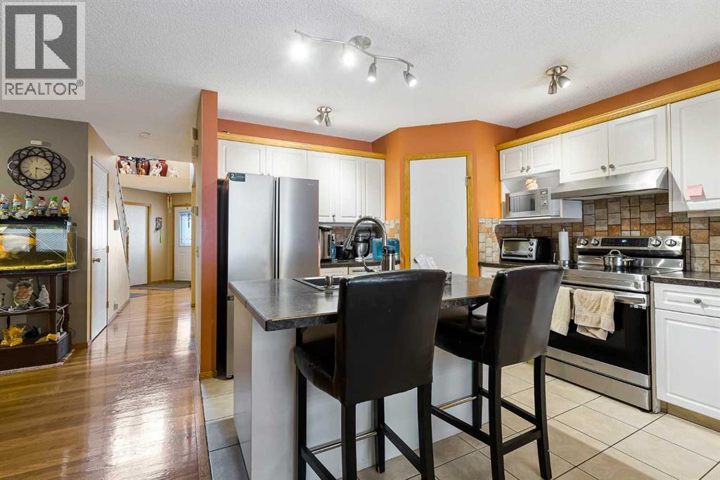 332 Harvest Hills Drive Ne, Calgary, Alberta  T3K 4H7 - Photo 10 - A2288215
