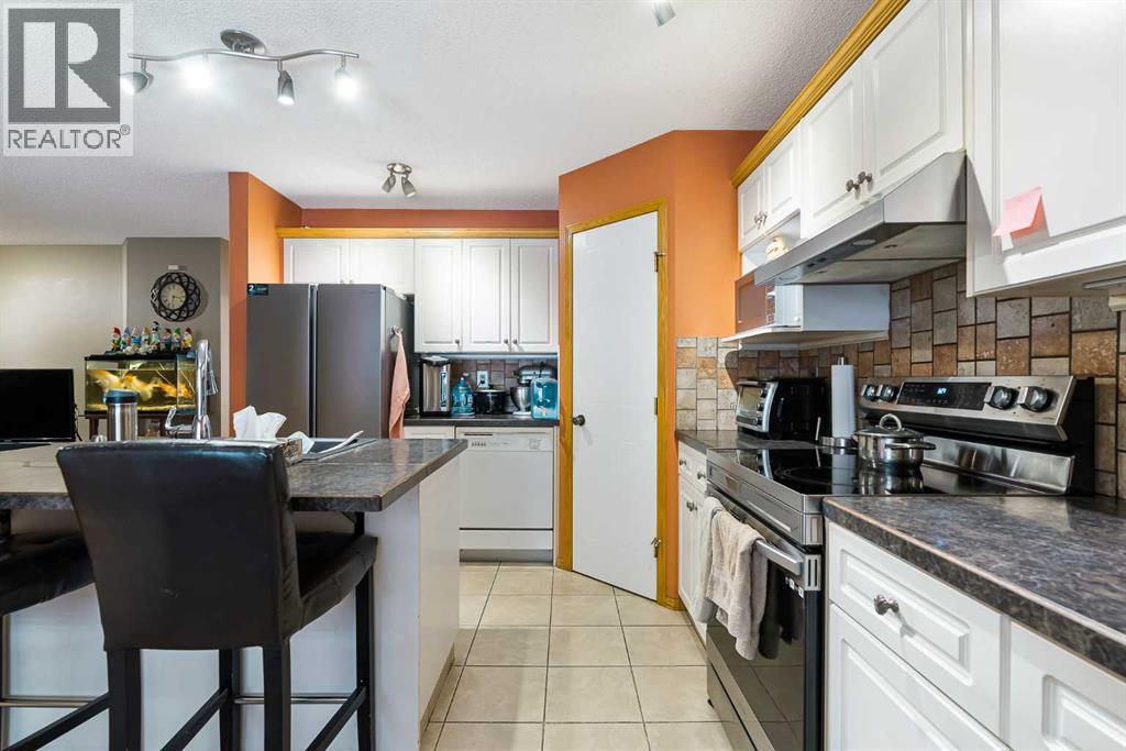 332 Harvest Hills Drive Ne, Calgary, Alberta  T3K 4H7 - Photo 11 - A2288215
