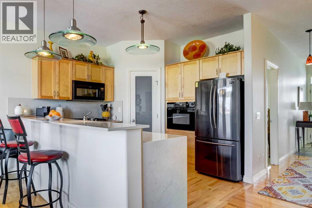 55 Tucker Circle, Okotoks, Alberta  T1S 2K1 - Photo 9 - A2305365