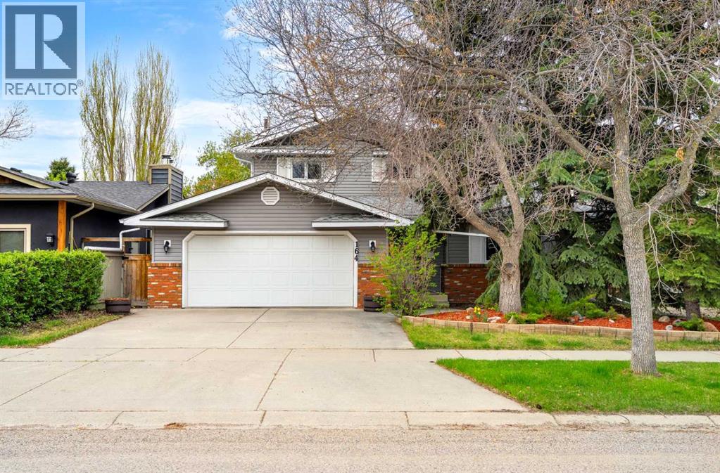 164 Sun Valley Drive Se, Calgary, Alberta  T2X 2C1 - Photo 1 - A2307742