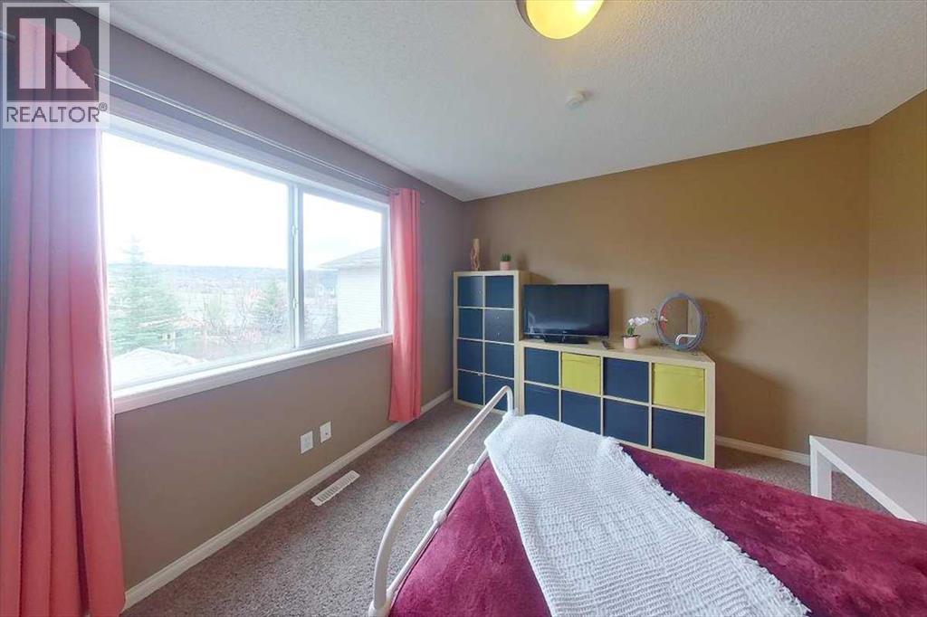 8 Sunset Square, Cochrane, Alberta  T4C 0H4 - Photo 30 - A2310409