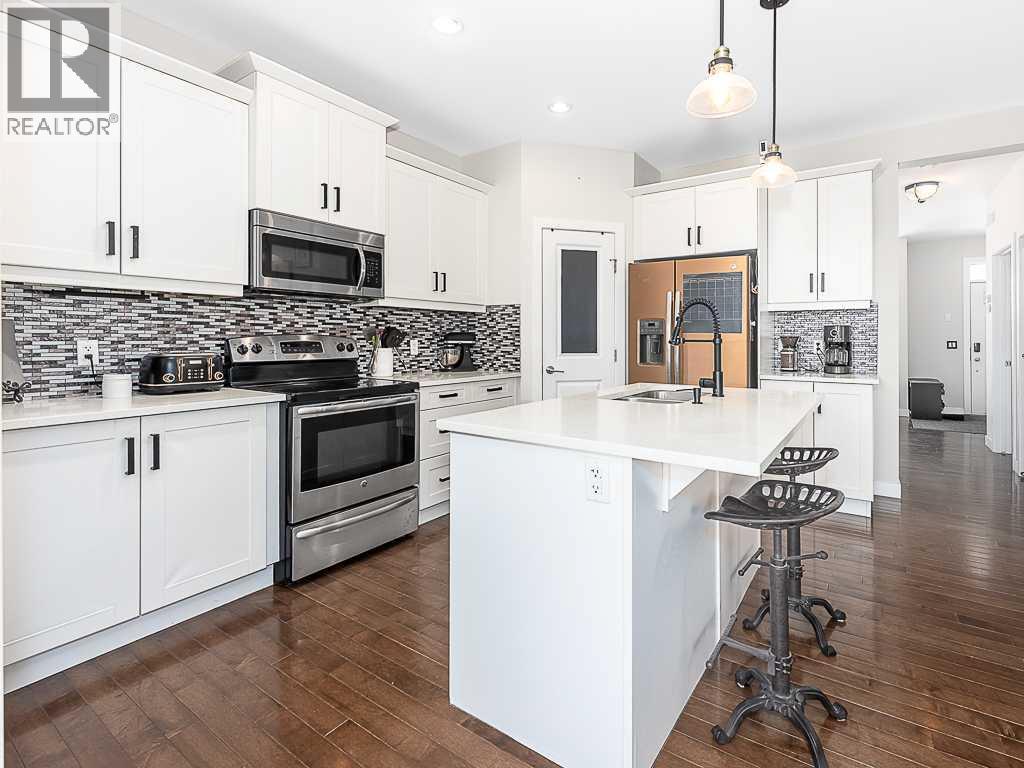 608 Evansborough Way NW, Calgary, Alberta  T3P 0M2 - Photo 8 - A2305739