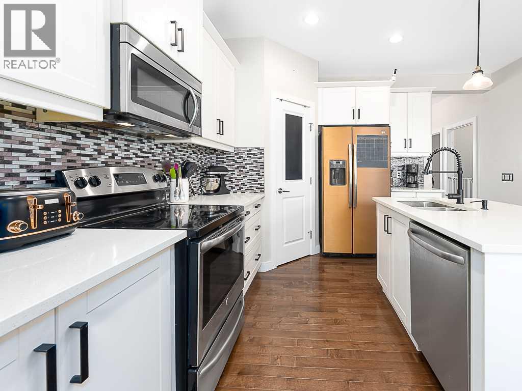 608 Evansborough Way NW, Calgary, Alberta  T3P 0M2 - Photo 9 - A2305739