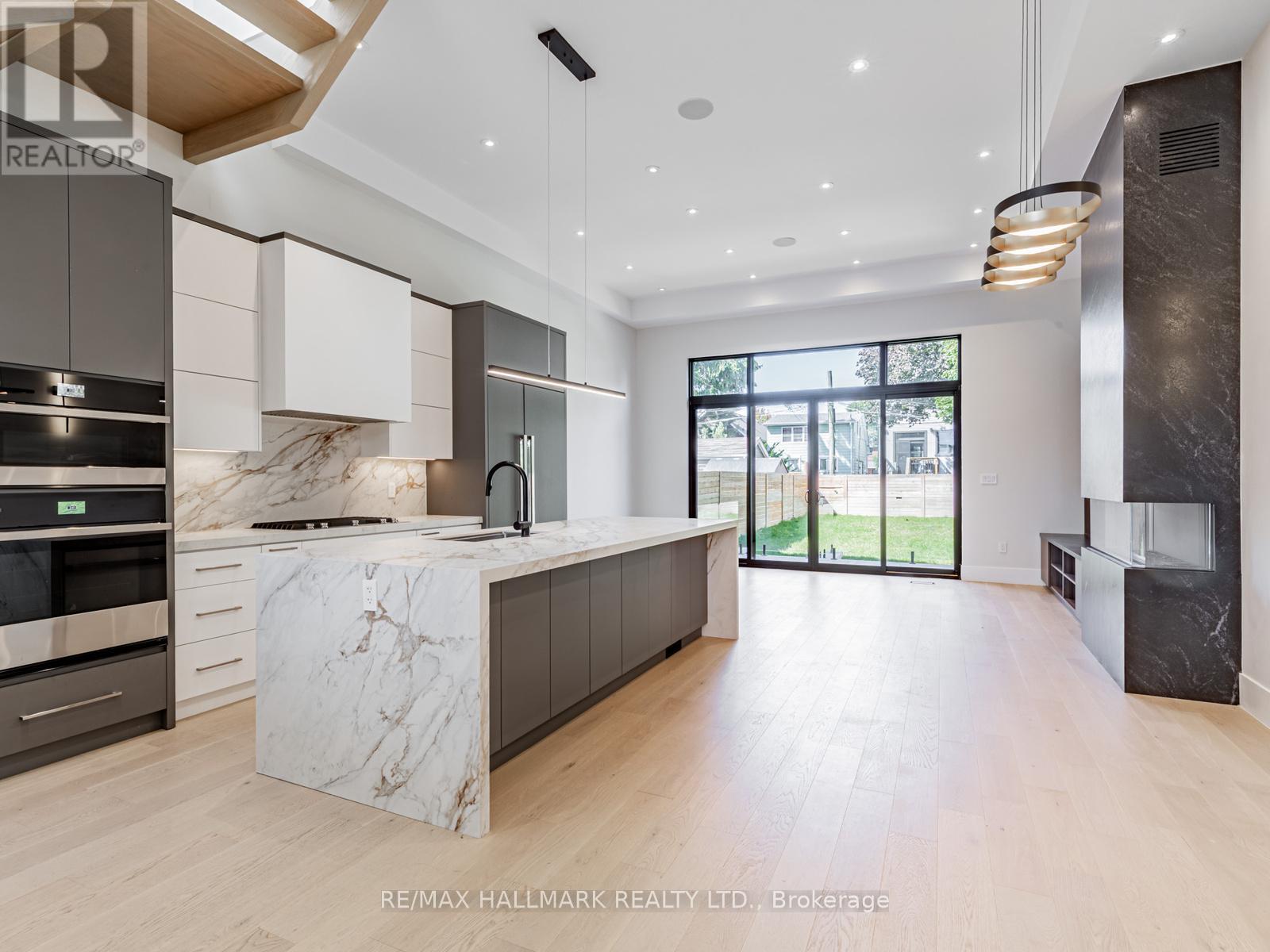 80 Barker Avenue, Toronto, Ontario  M4C 2N6 - Photo 4 - E13133028