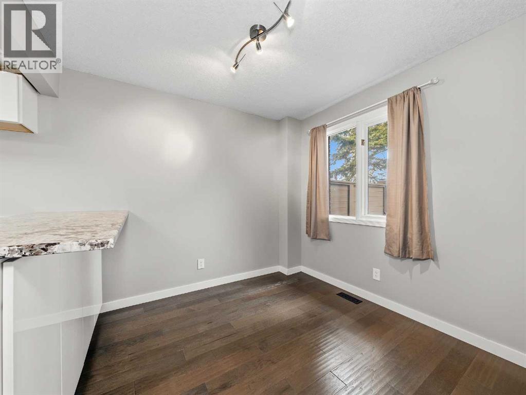 202, 829 Coach Bluff Crescent SW, Calgary, Alberta  T3H 1B1 - Photo 5 - A2307747
