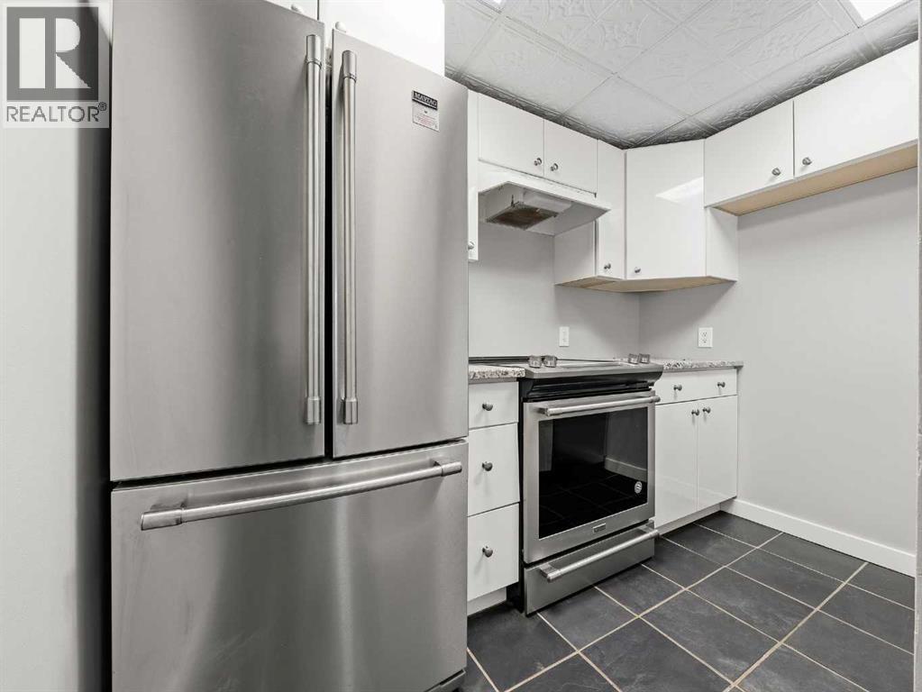 202, 829 Coach Bluff Crescent SW, Calgary, Alberta  T3H 1B1 - Photo 6 - A2307747