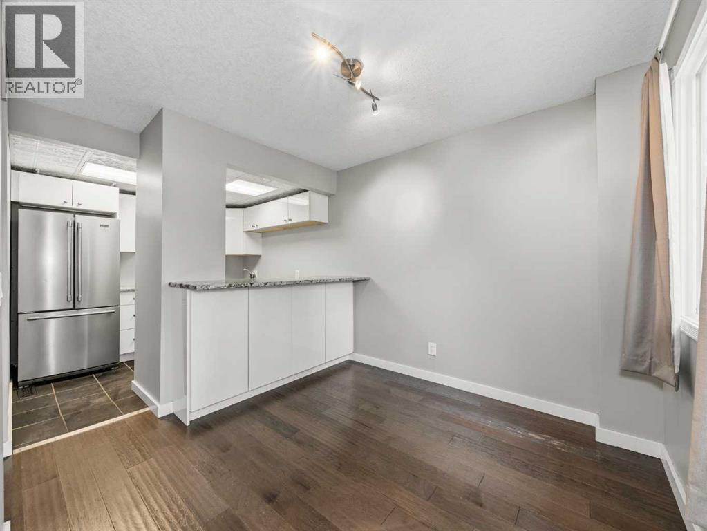 202, 829 Coach Bluff Crescent SW, Calgary, Alberta  T3H 1B1 - Photo 2 - A2307747