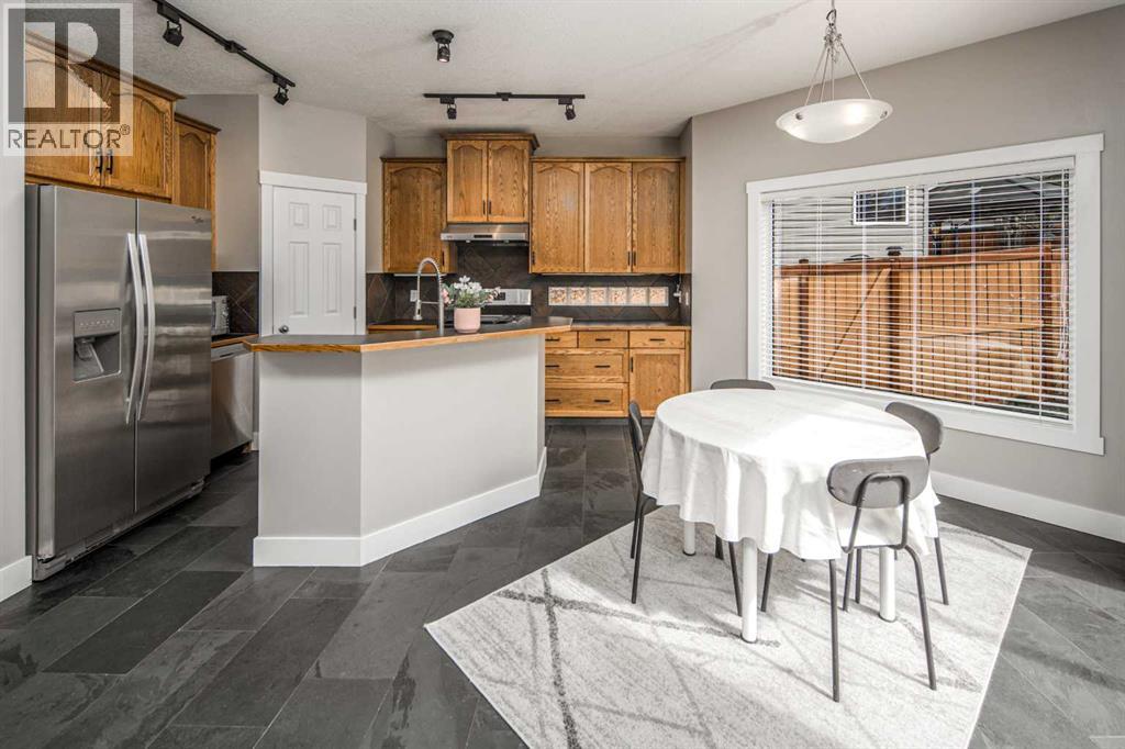 10514 Rockyledge Street Nw, Calgary, Alberta  T3G 5N2 - Photo 2 - A2309983
