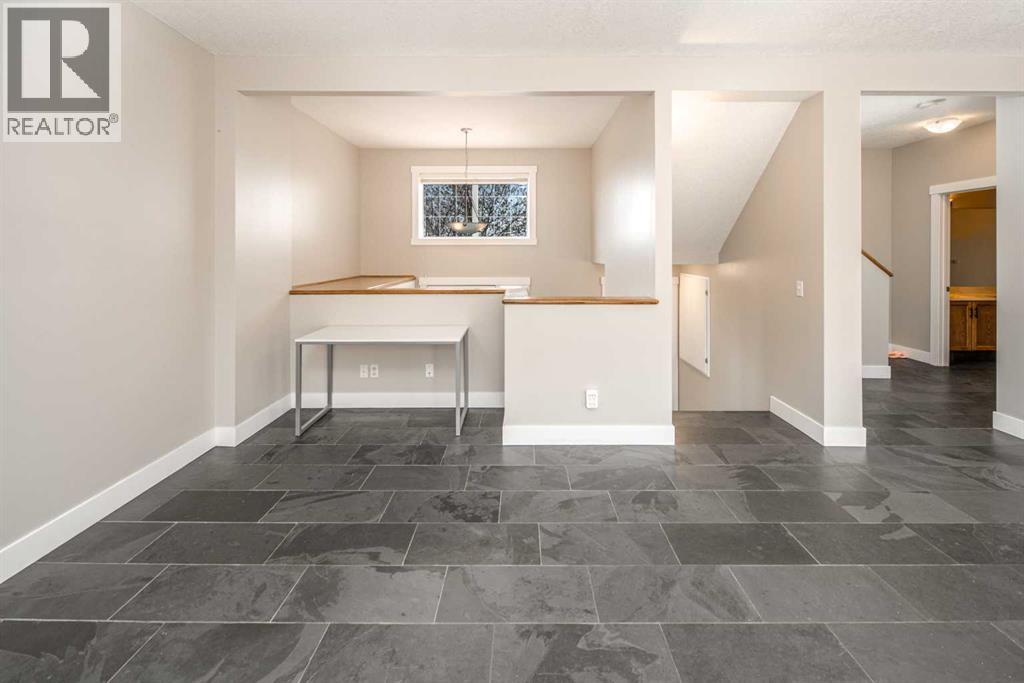 10514 Rockyledge Street Nw, Calgary, Alberta  T3G 5N2 - Photo 6 - A2309983