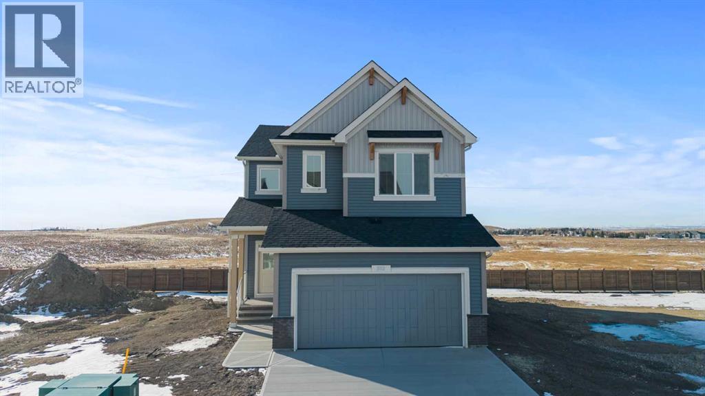 512 Lawthorn Way SE, Airdrie, Alberta  T4A 3N9 - Photo 2 - A2292536