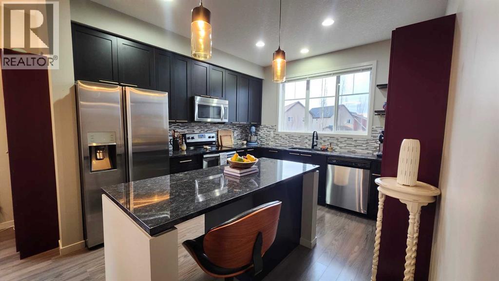 113 Copperpond Row SE, Calgary, Alberta  T2Z 1H3 - Photo 4 - A2302891