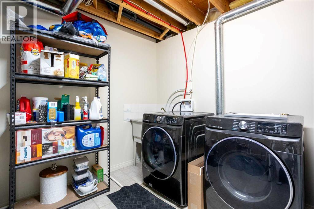 184 Inglewood Cove Se, Calgary, Alberta  T2G 5K3 - Photo 34 - A2311274