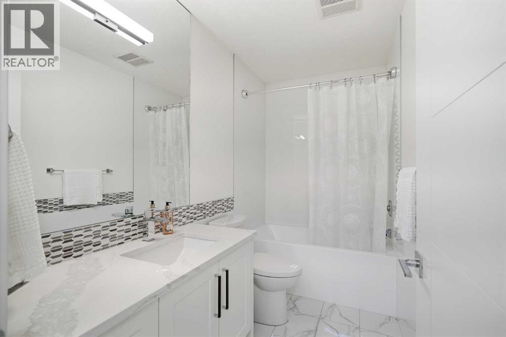 1256 Rosehill Drive NW, Calgary, Alberta  T2K 1M2 - Photo 18 - A2307426