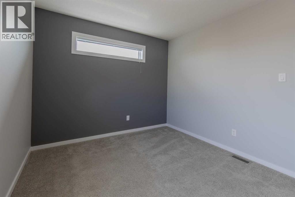 1, 1180 Keystone Road W, Lethbridge, Alberta  T1J 5H6 - Photo 42 - A2310137