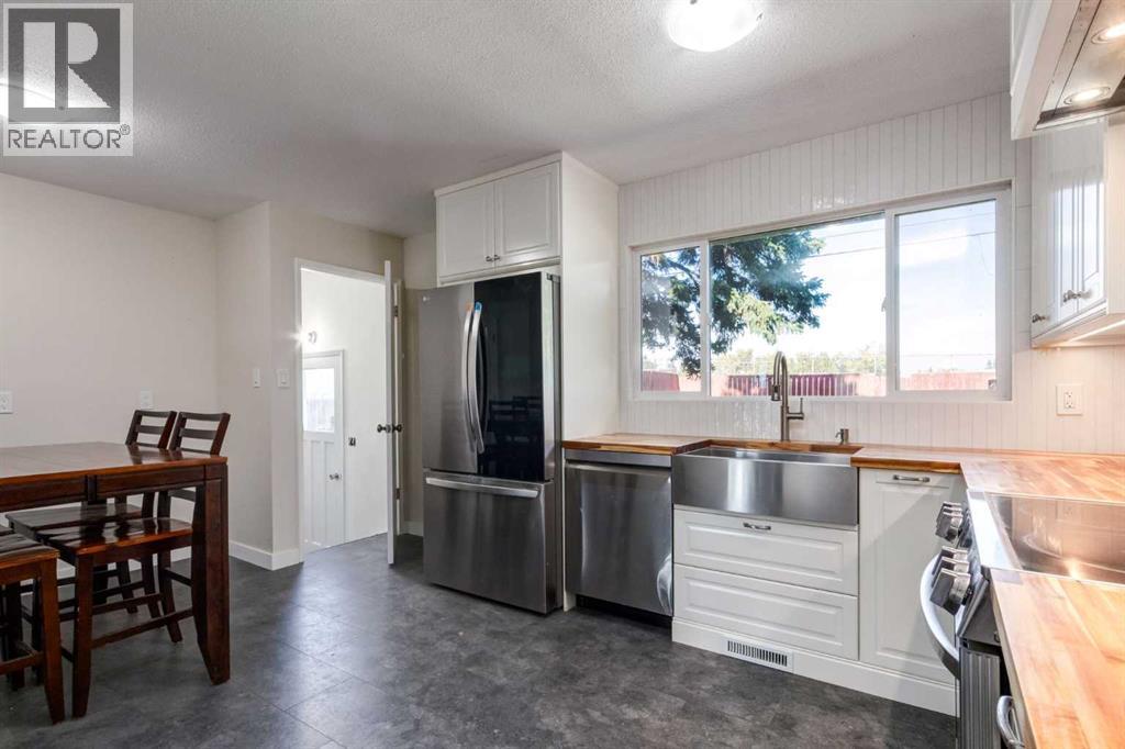 840 Raynard Crescent Se, Calgary, Alberta  T2A 1X7 - Photo 7 - A2306882
