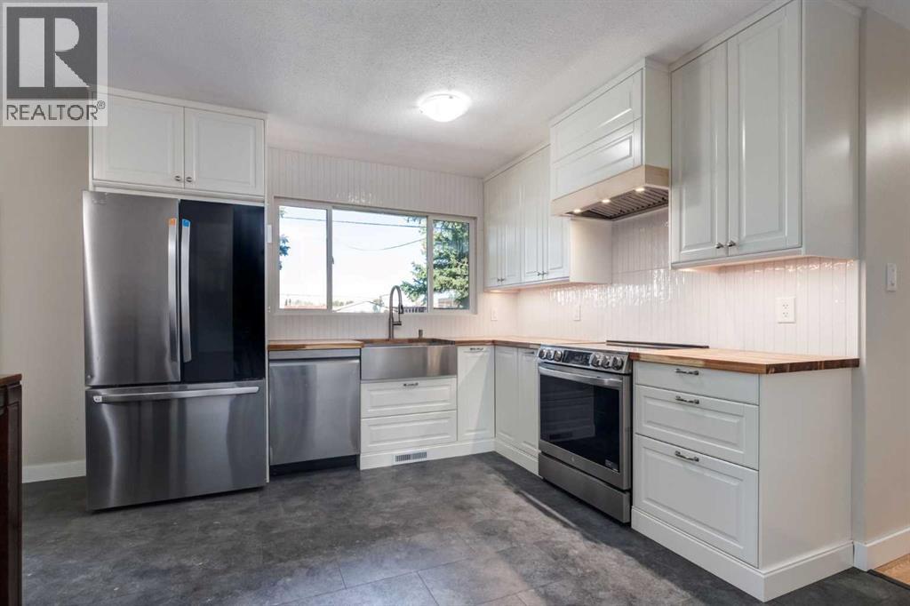 840 Raynard Crescent Se, Calgary, Alberta  T2A 1X7 - Photo 4 - A2306882