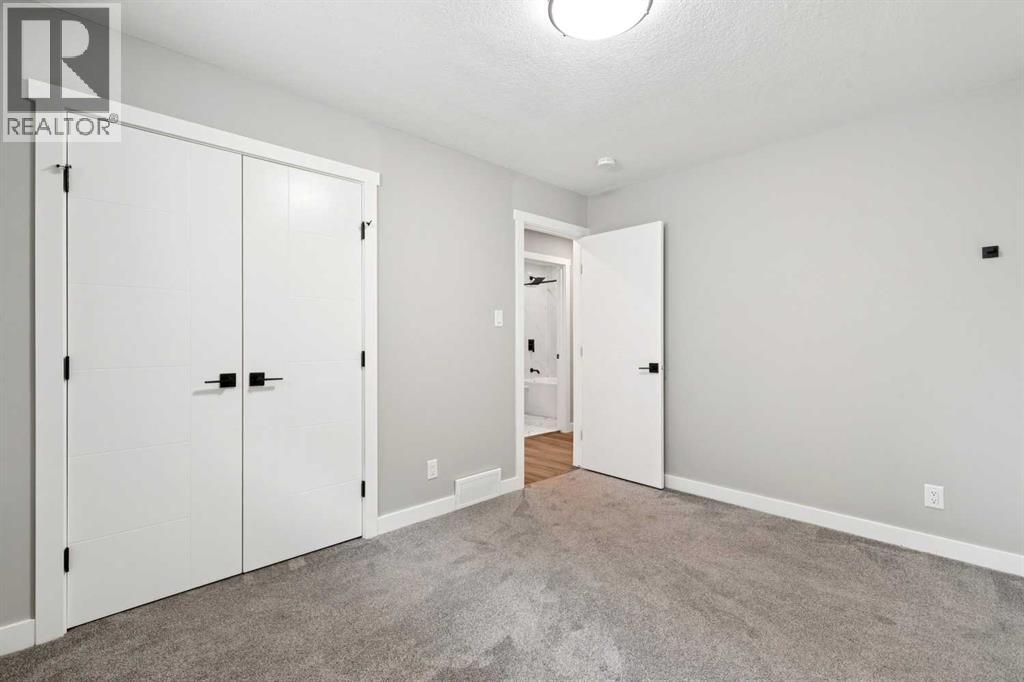 7116 Hunterwood Road Nw, Calgary, Alberta  T2K 4J6 - Photo 19 - A2311232