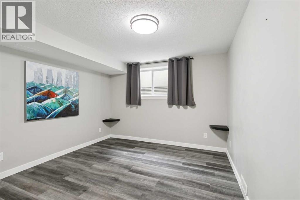 7116 Hunterwood Road Nw, Calgary, Alberta  T2K 4J6 - Photo 30 - A2311232