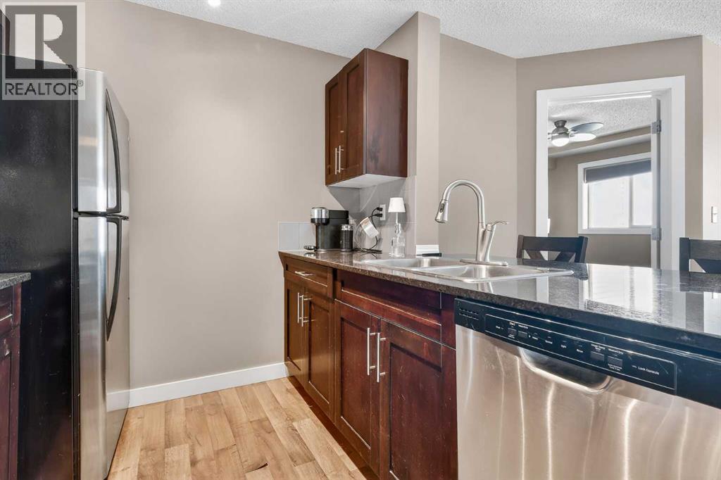 4317, 403 Mackenzie Way SW, Airdrie, Alberta  T4B 3V7 - Photo 4 - A2298434