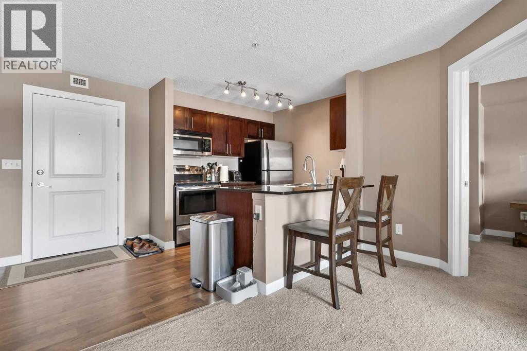 4317, 403 Mackenzie Way SW, Airdrie, Alberta  T4B 3V7 - Photo 2 - A2298434