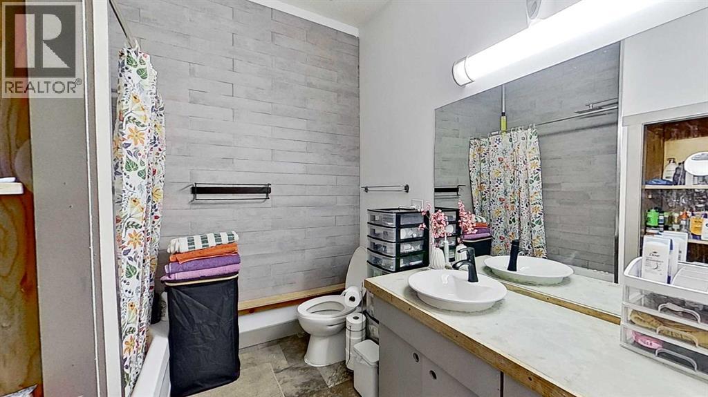 11723 Canfield Road SW, Calgary, Alberta  T2W 1J6 - Photo 15 - A2303589