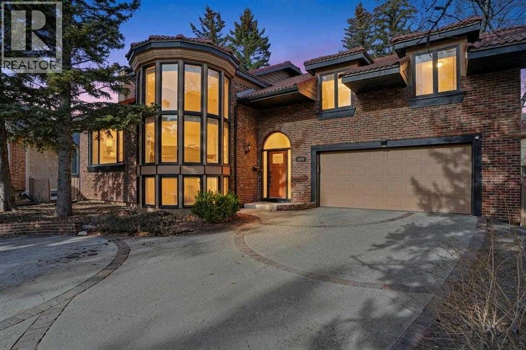 311 Coach Light Bay SW, Calgary, Alberta  T3H 1X3 - Photo 1 - A2305942