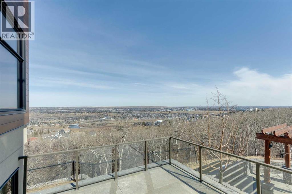 312, 15 Cougar Ridge Landing SW, Calgary, Alberta  T3H 6C3 - Photo 33 - A2295603