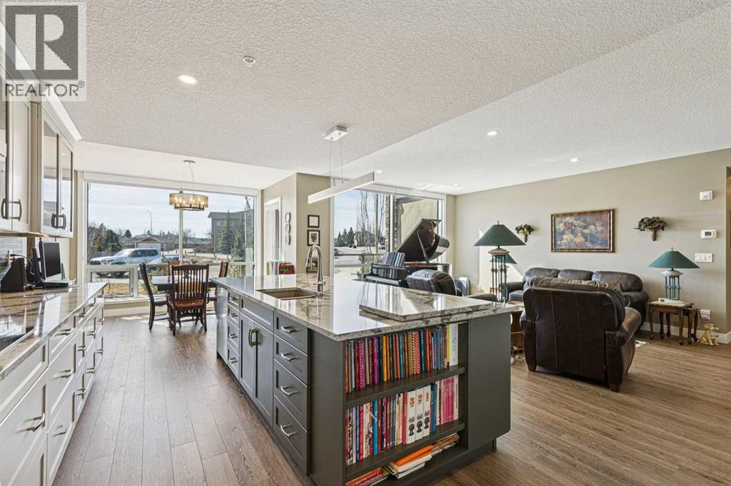 312, 15 Cougar Ridge Landing SW, Calgary, Alberta  T3H 6C3 - Photo 6 - A2295603