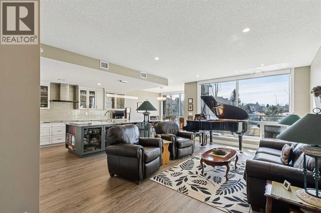 312, 15 Cougar Ridge Landing SW, Calgary, Alberta  T3H 6C3 - Photo 3 - A2295603