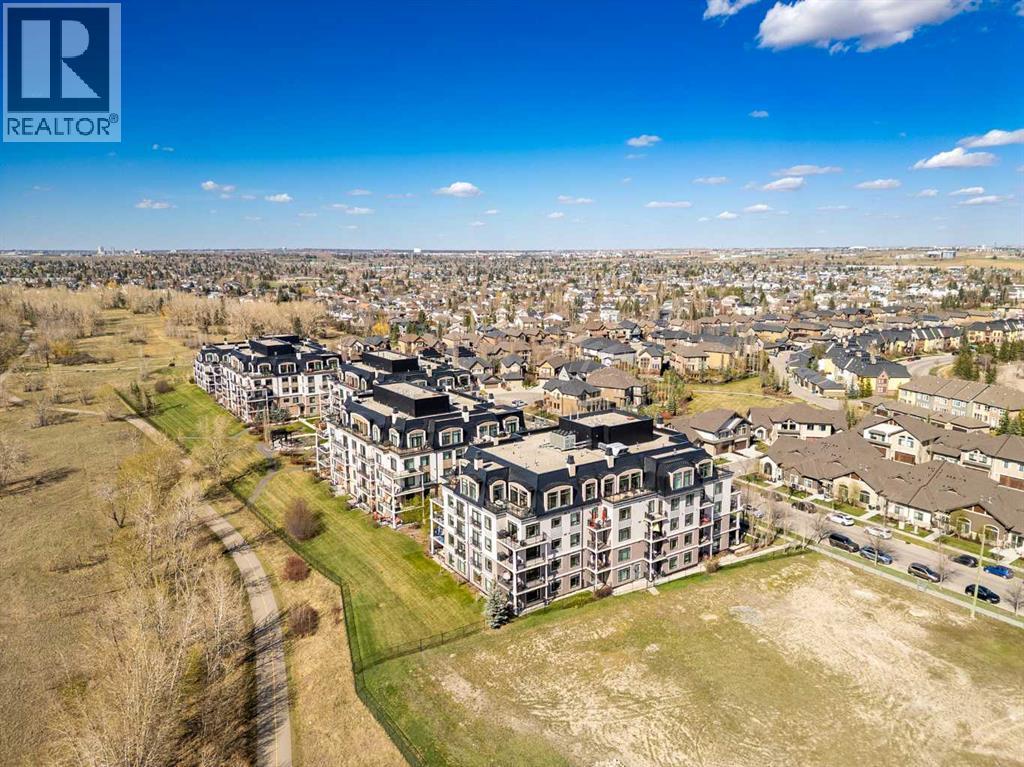 305, 221 Quarry Way SE, Calgary, Alberta  T2C 5M7 - Photo 2 - A2308616