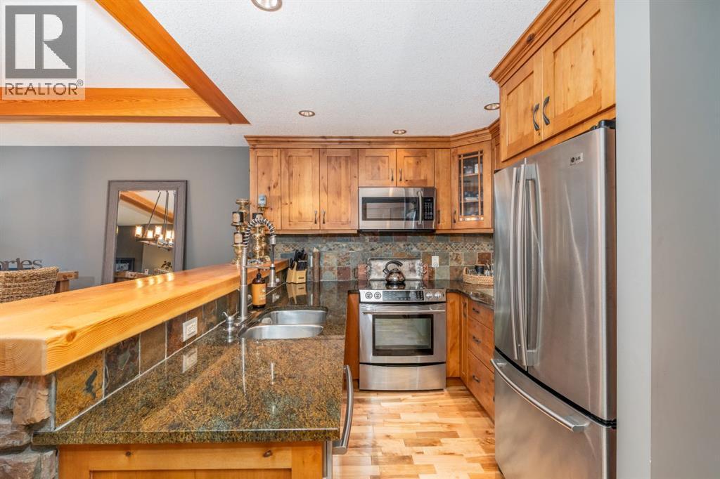 2207, 101b Stewart Creek Landing, Canmore, Alberta  T1W 0E3 - Photo 4 - A2311853