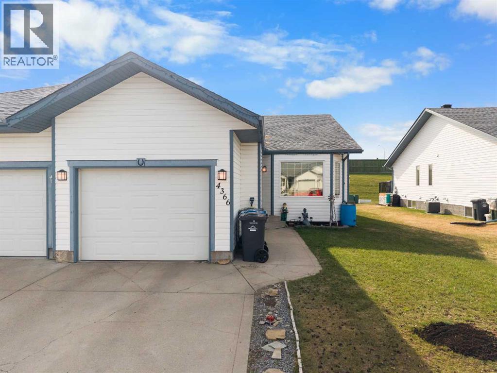 4366 54a Avenue Close, Innisfail, Alberta  T4G 1X5 - Photo 2 - A2307965